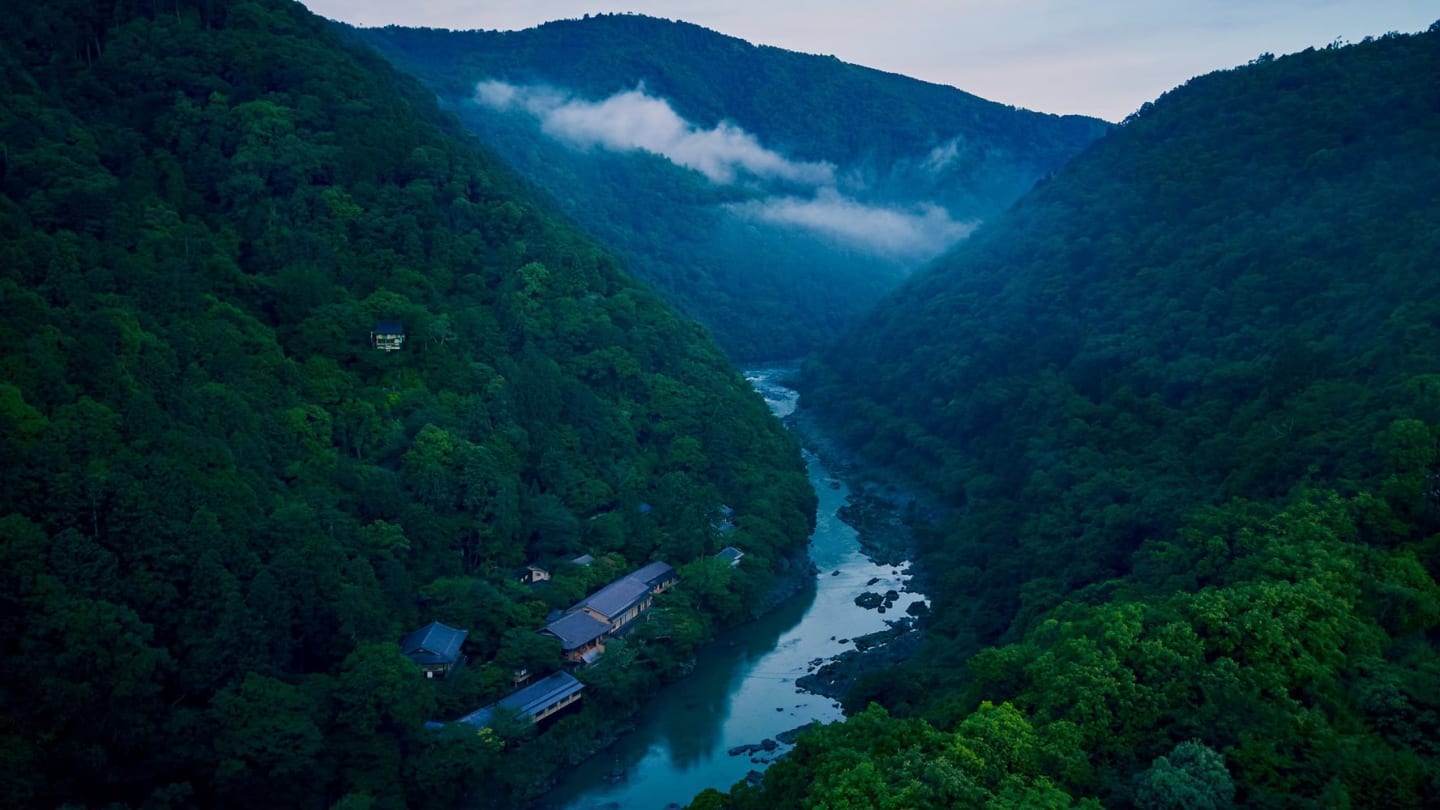 Hoshinoya Kyoto traditional Japanese riverside ryokan nestled in a forested gorge in Arashiyama Kyoto Japan