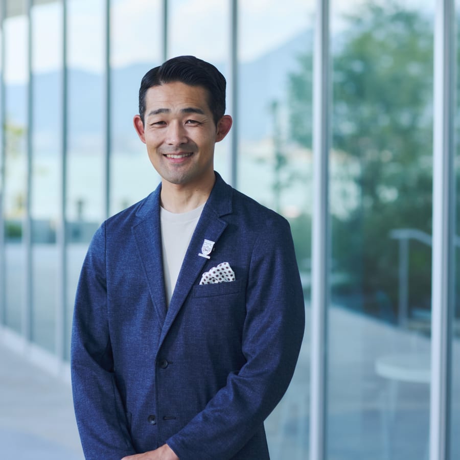 Yoshitaka Suzuki, General Manager